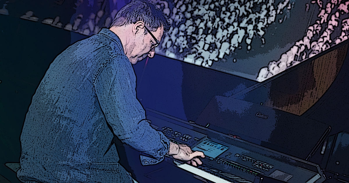 Kleine Dokumentation im Comic-Style zum Yamaha-Videodreh Digitalpiano Clavinova CVP-809 mit Susan Albers und Peter Baartmans im Musikhaus Kirstein in Schongau. Comic-Bild 26: Peter Baartmans sitzt am Digitalflügel und spielt.